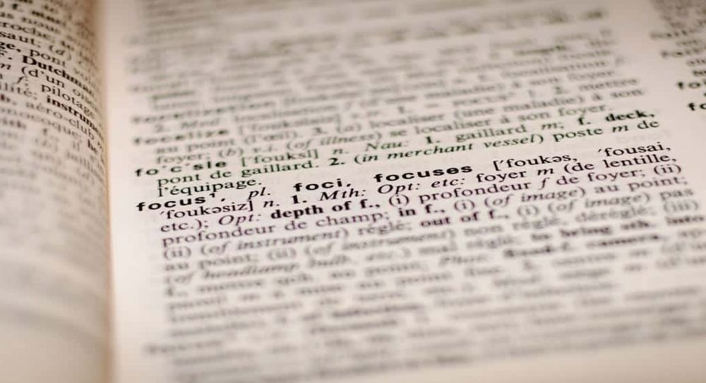 A zoomed in photograph of a page in a dictionary.