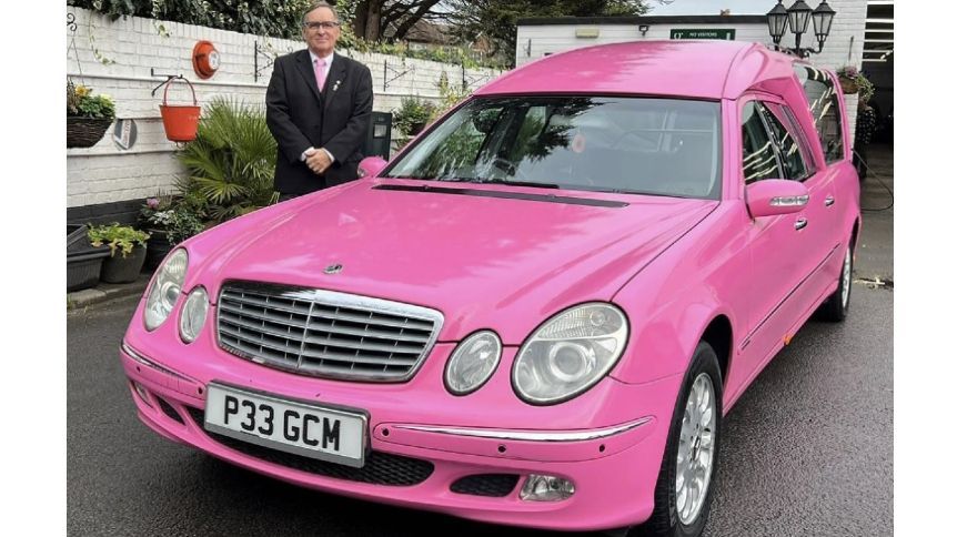 Bright pink funeral hearse